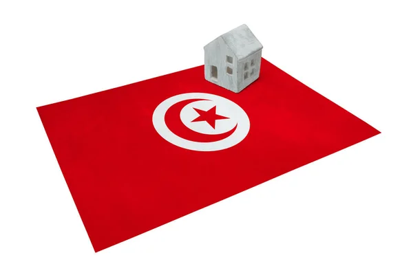 Litet hus på en flagga - Tunisien — Stockfoto