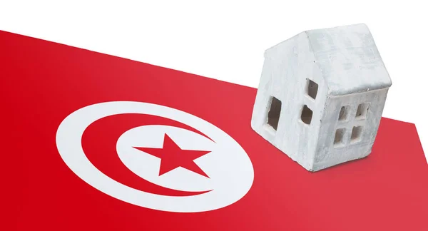 Litet hus på en flagga - Tunisien — Stockfoto