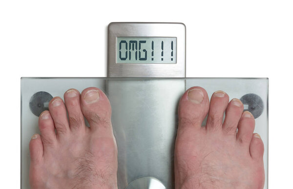 Man's feet on weight scale - OMG