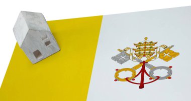 Bir bayrak - Vatikan üzerinde küçük ev