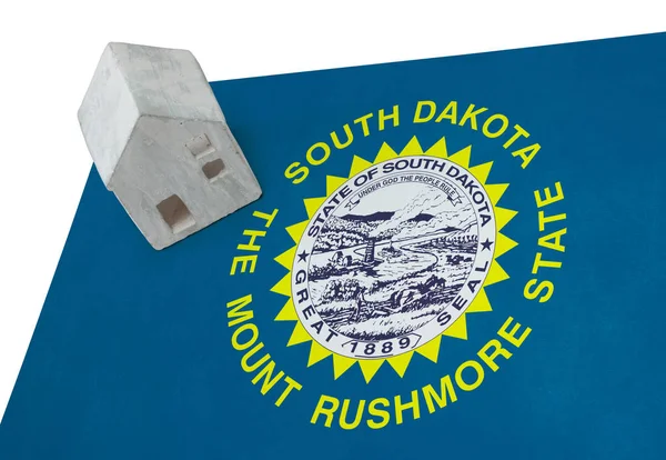 Small house on a flag - South Dakota — Stock Photo, Image