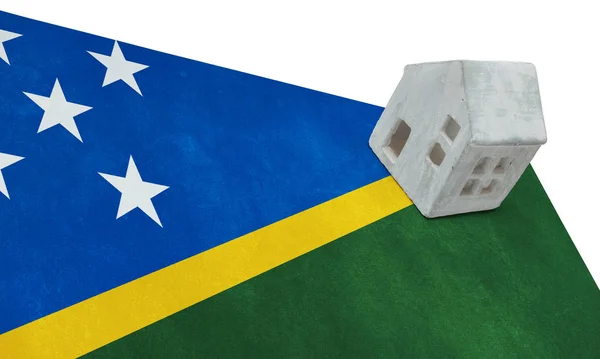 Piccola casa su una bandiera - Isole Salomone — Foto Stock