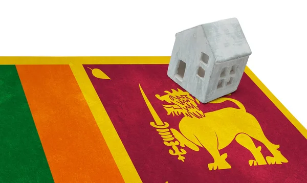 Small house on a flag - Sri Lanka — Stock Photo, Image