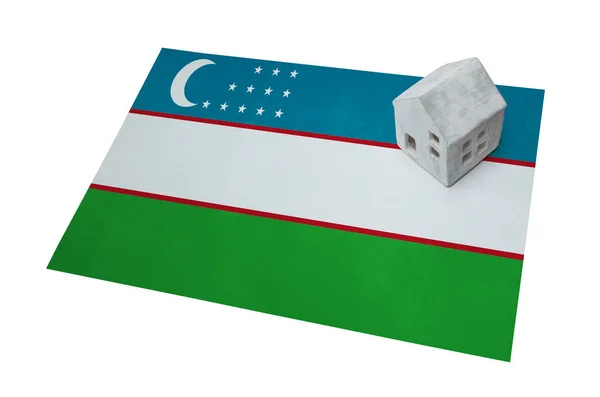 Kleines Haus auf einer Fahne - Usbekistan — Stockfoto