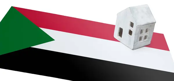 Small house on a flag - Sudan — Stock Photo, Image