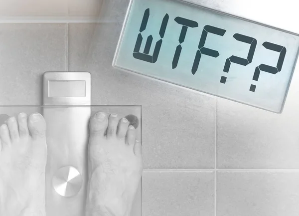 Man's feet on weight scale - WTF!!!