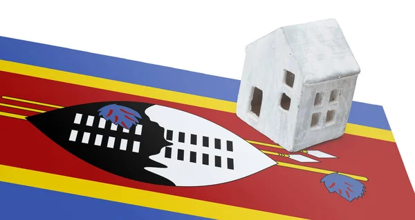 Kleines Haus auf einer Fahne - Swasiland — Stockfoto