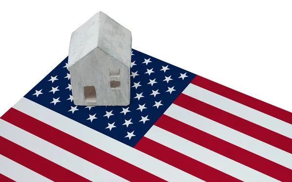 Small house on a flag - USA — Stock Photo, Image