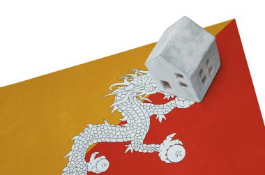 Bir bayrak - Bhutan üzerinde küçük ev