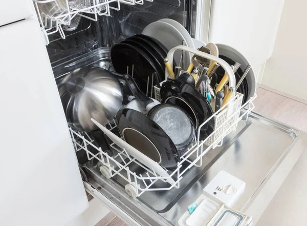 Open dishwasher with clean plates, cups and dishes — Stock Photo, Image