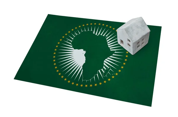 Small house on a flag - African Union — Stock Photo, Image