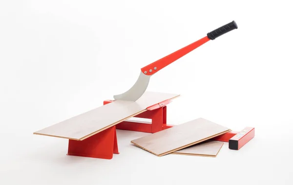 Röd verktyg för skärande laminat — Stockfoto