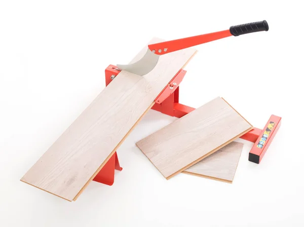 Röd verktyg för skärande laminat — Stockfoto