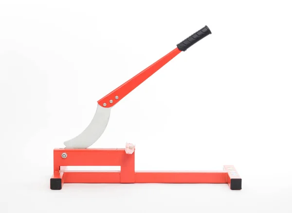 Red tool for cutting laminate — Stock Photo, Image