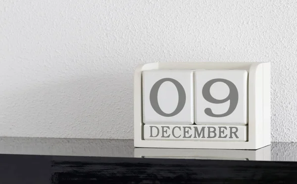 Calendário bloco branco data presente 9 e mês Dezembro — Fotografia de Stock