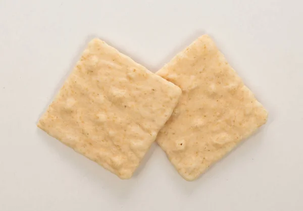 Simple square crackers isolated — Stock Photo, Image