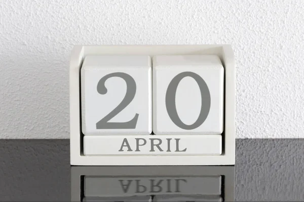 White block calendar present date 20 and month April — Stock Photo, Image
