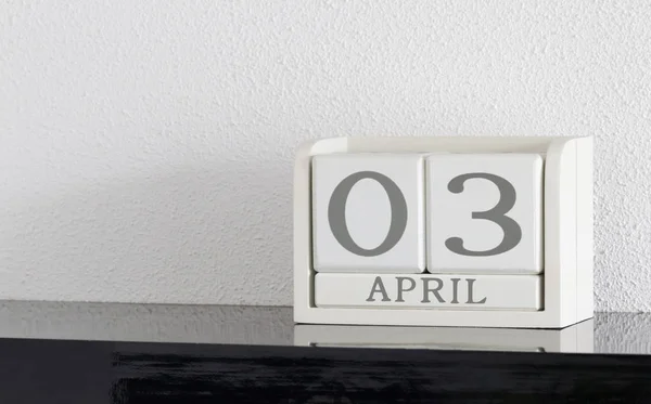 White block calendar present date 3 and month April — Stock Photo, Image