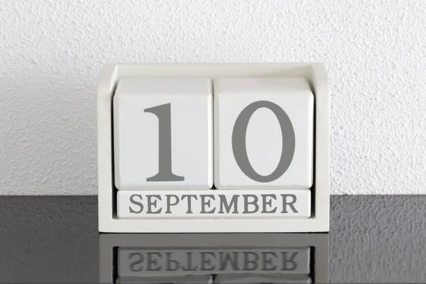 White block calendar present date 10 and month September — Stock Photo, Image
