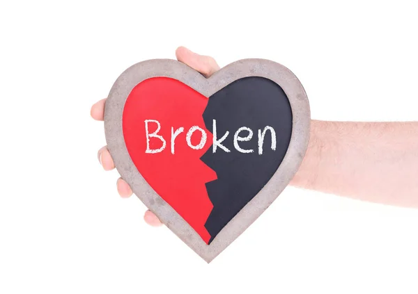 Adult holding heart shaped chalkboard - Broken — Stock Photo, Image