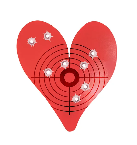 Bulletholes dans une cible métallique en forme de coeur — Photo