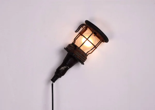 Old vintage light from the 70s, hanging on wall — Stock Photo, Image