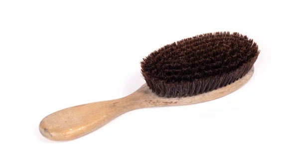 Old hair brush with some hair in it — Stock Photo, Image