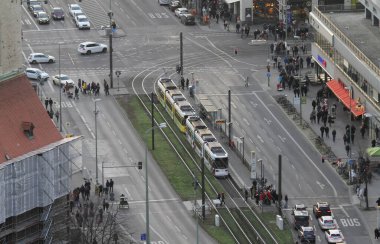 BERLIN, GERMANY on December 31, 2019: People pass tram ways in the city centre of Berlin.