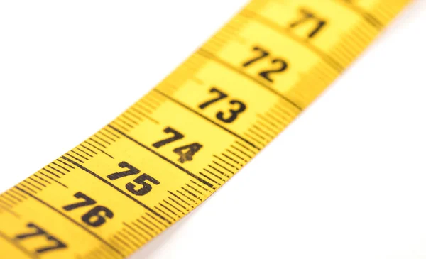 Close Yellow Measuring Tape Isolated White Selective Focus — Stock Photo, Image
