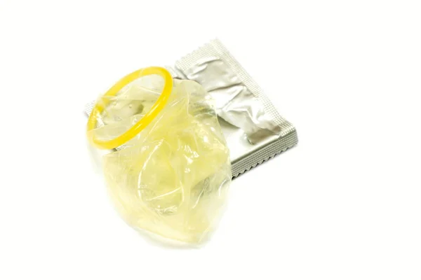 Condom and silver package — Stock Photo, Image