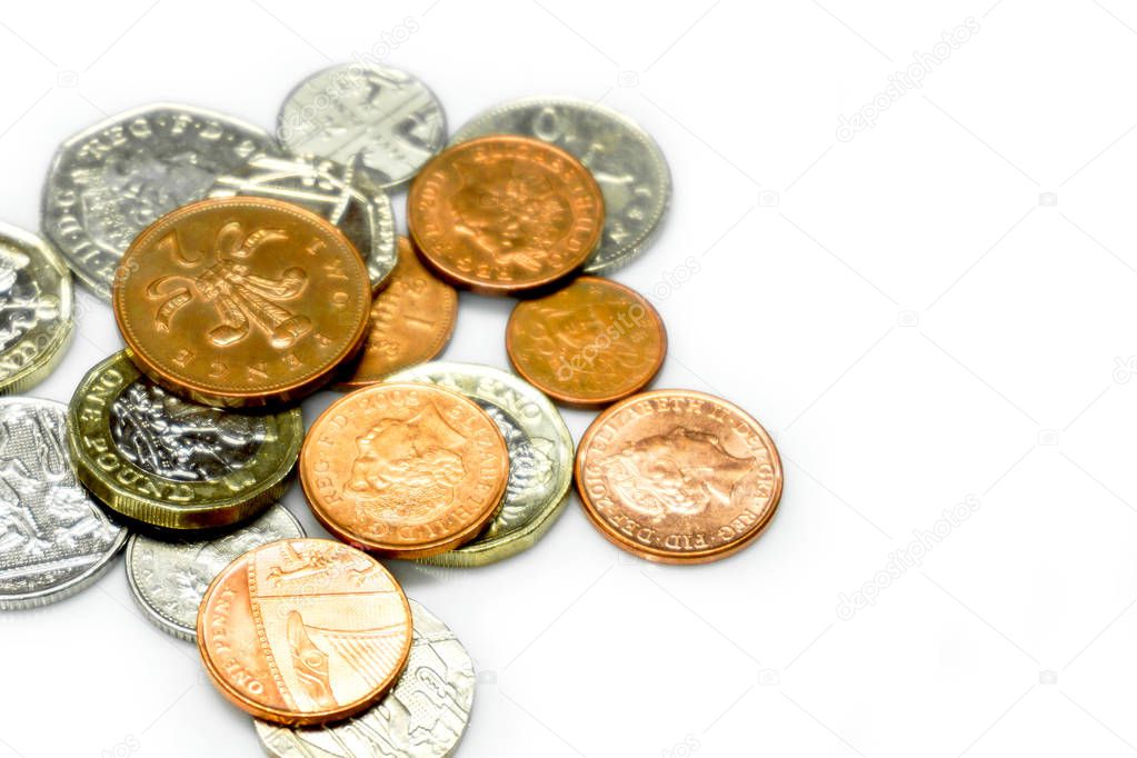 British currency coins crop and do copy space isolate on white background.
