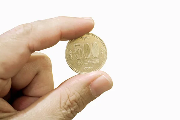 Hand Met Dat 500 Yen Japanse Munt Isoleren Witte Achtergrond — Stockfoto