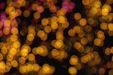 Bulanık ve bokeh yansıma aydınlatma led ışık bubs siyah arka plan üzerine, soyut.