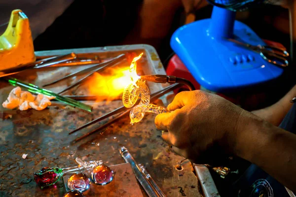 Image of hand made doll glass blowing.