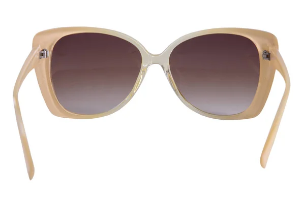 Goldene Sonnenbrille auf weißem Grund — Stockfoto