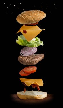 siyah arka plan üzerine destructured hamburger