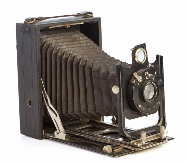 Old black camera with bellows Stock Picture