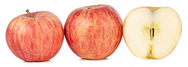 Два красных яблока и один разрез изолированы — стоковое фото