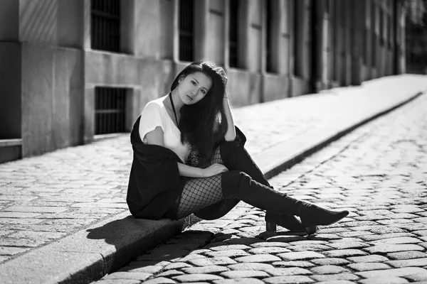 Beautiful asian woman wearing boots and fishnets — Stock Photo, Image