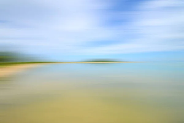 Rörelse suddig bakgrund av himmel och hav — Stockfoto