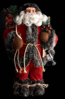 Noel Baba, izole bir siyah arka plan üzerine.