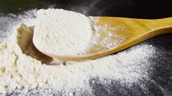 Flour Wooden Spoon Black Background — Stock Photo, Image