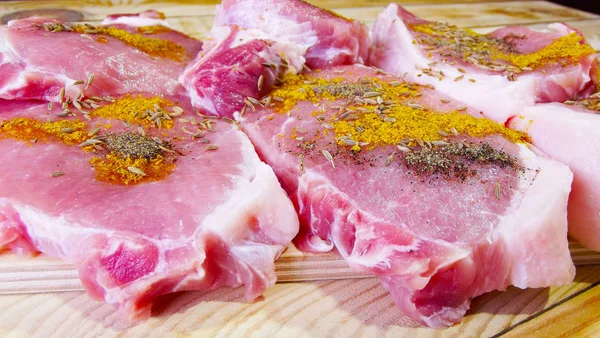Fresh meat cut up into steaks.