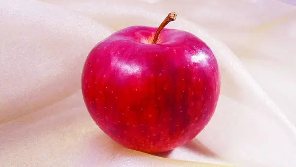 Red Apple Tle Światła Tkaniny — Zdjęcie stockowe