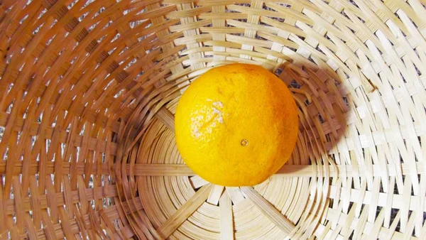 One Tangerine Wicker Basket — Stock Photo, Image