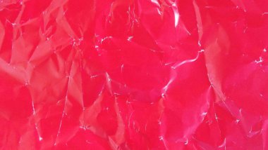 Kırmızı kağıdın soyut arkaplanı.