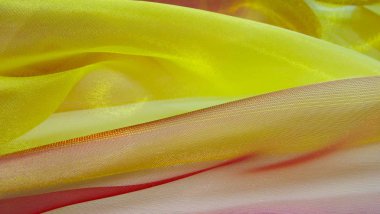 Hafif kumaştan yapılmış, güzel sarı ve pembe arka plan.