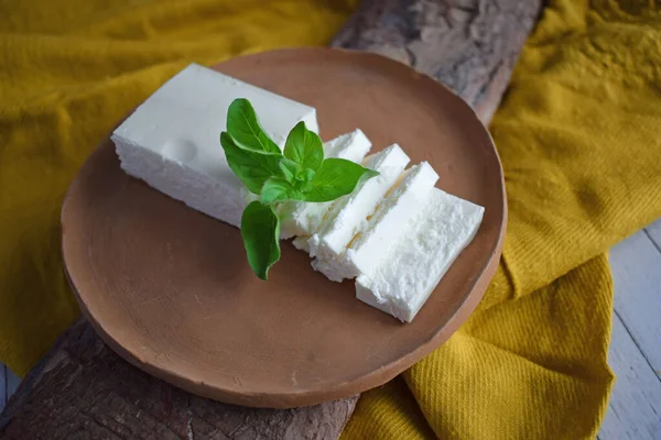 Pickled Cheese Cut Pieces Sprig Greens Clay Plate — Stock Photo, Image