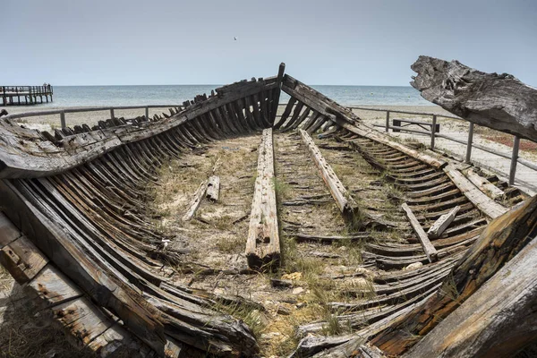 Former barge for the transport of salt. Photo taken in Santa Pola, Alicante, Spain, by the Mediterranean Sea