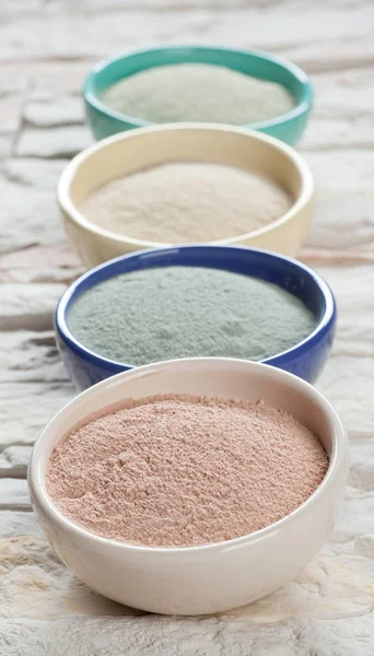 Bowls with different types of clay powder — Stock Photo, Image